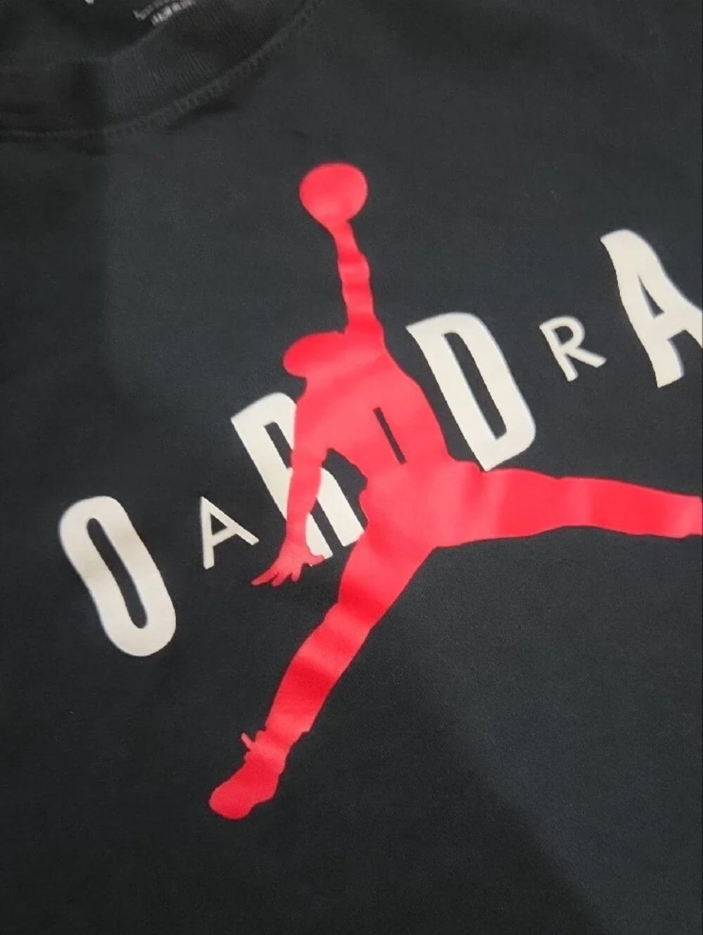 Jordan Black Short-Sleeve Tee with Red Jumpman and White Lettering